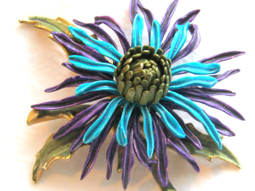 brooch with enamel flower necklace