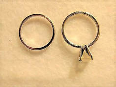 Ring with arrow on sale mark